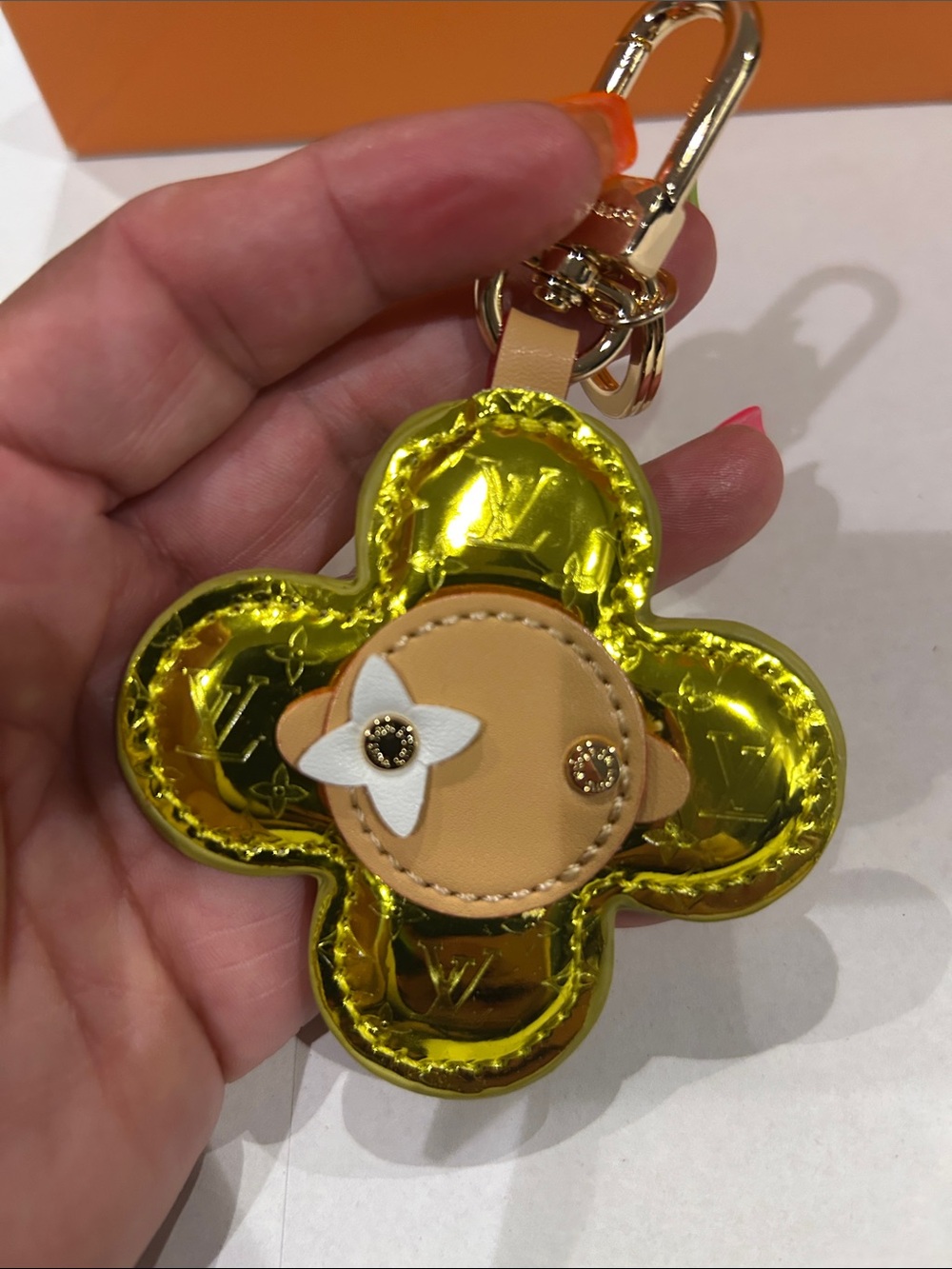 Gold bag charm